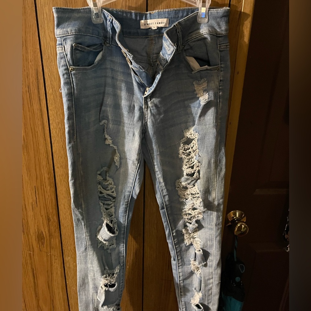 Ripped blue jean pants